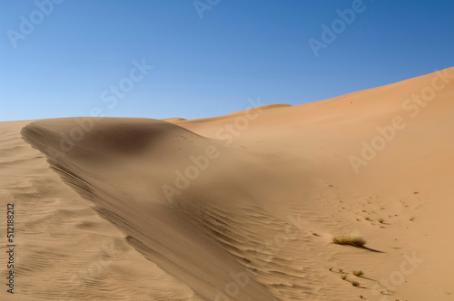 Sand dunes in a desert, Tadrart Acacus, Fezzan, Libya photo