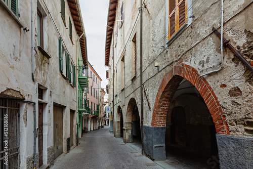 Narrow street in the city of Albenga. Italy 