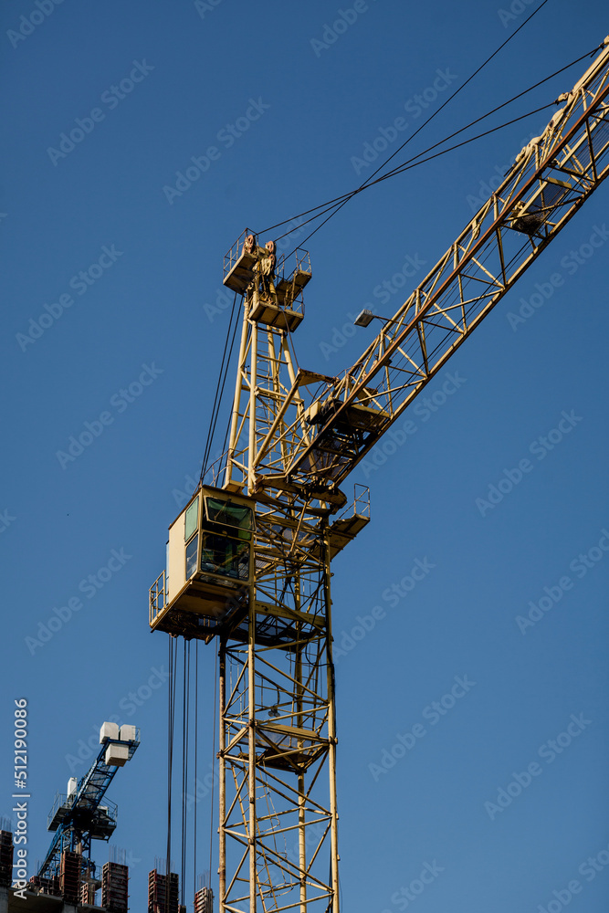 yellow tower crane