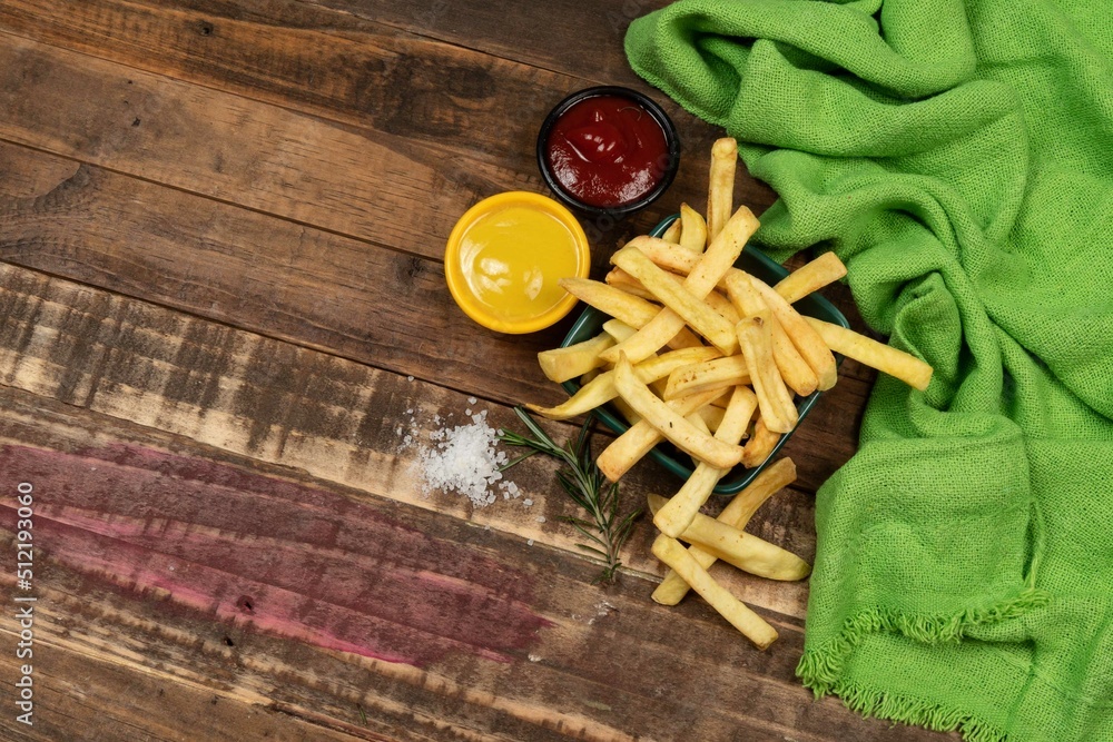 Tasty french fries on plate on bowl Tasty french fries on plate on bowl