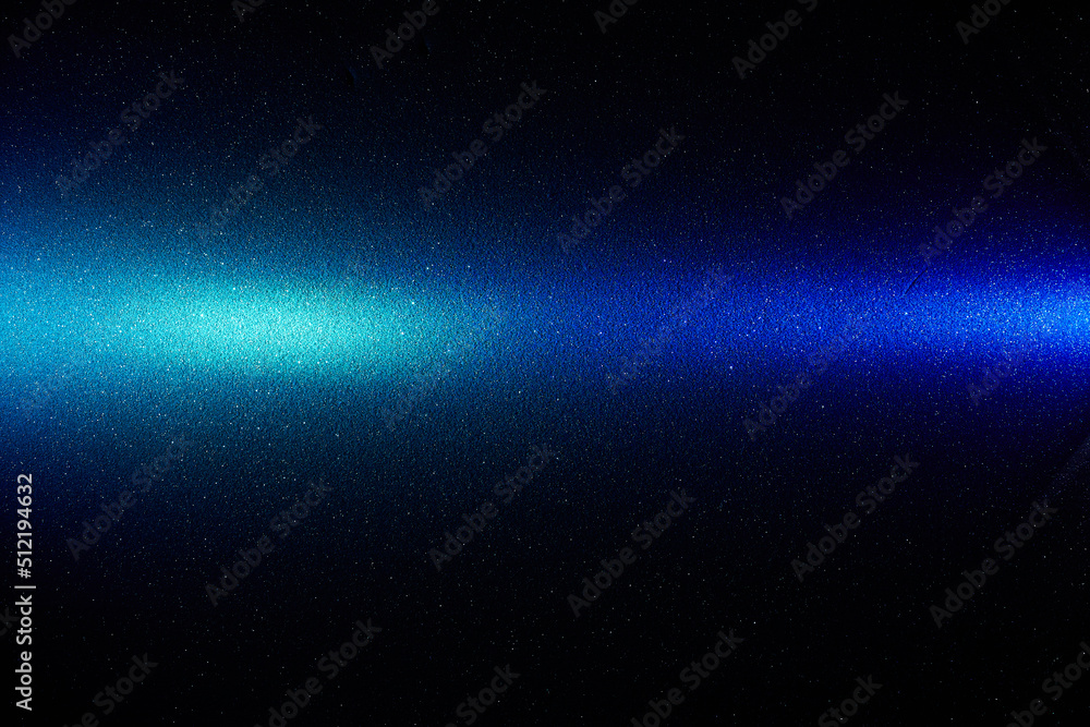 Fototapeta premium On a black smooth background, a blue gradient horizontal beam of light
