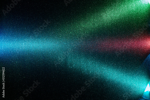 On a black background, multi-colored gradient light rays intersect at one point