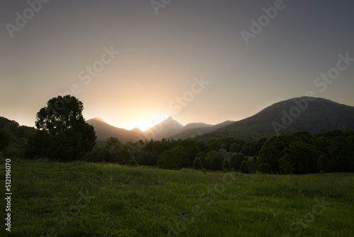 Sun setting behind Mount Warning in Tweed Shire photo