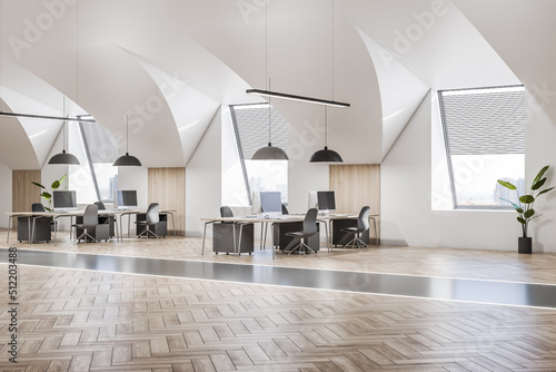 Perspective view on stylish interior design spacious coworking office with parquet floor, modern computers on wooden tables and city view from windows with blinds. 3D rendering © Who is Danny