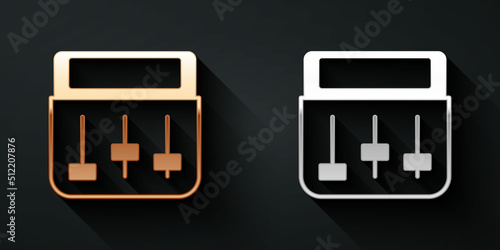 Gold and silver Drum machine music producer equipment icon isolated on black background. Long shadow style. Vector