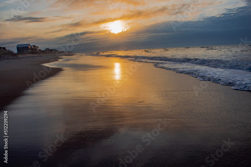 sunrise on the beach © Timothy