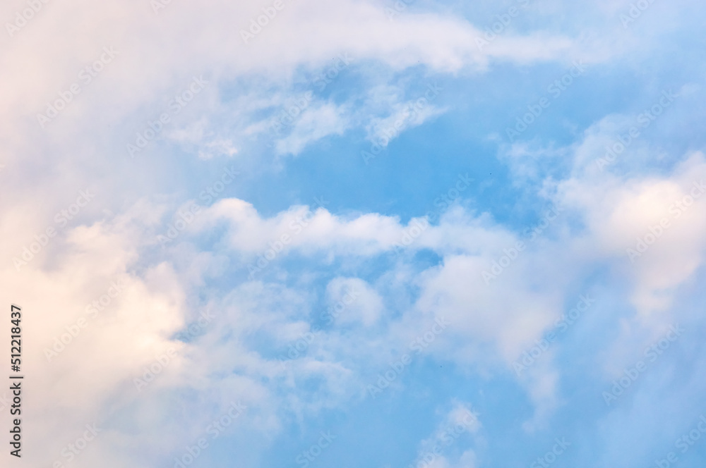 Clouds in the blue sky. Abstract background. Clouds in the blue sky. Abstract background.