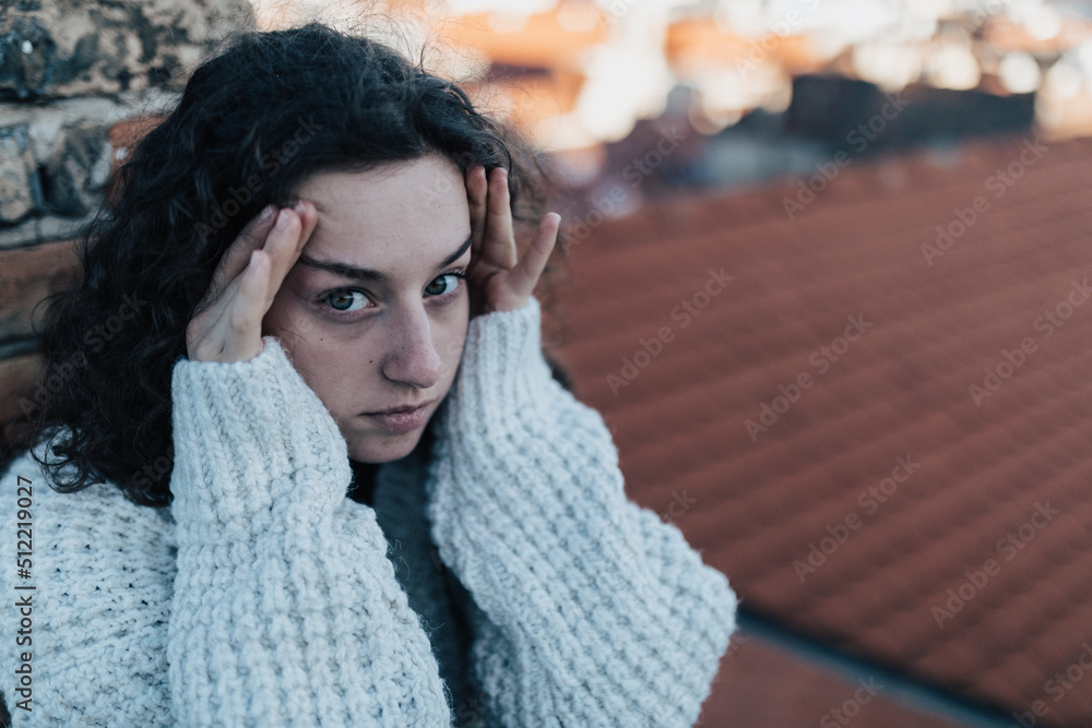 Portrait of unhappy young woman in depression life period.