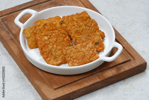 tempeh tempe goreng  Indonesian traditional food made from fermented soybeans. They are usually wrapped in banana leaves.