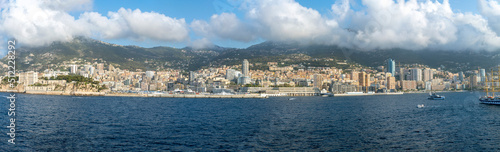 Panoramic view from the Mediterranean sea of the country of Monaco and the city of Monte Carlo along the French Riviera.