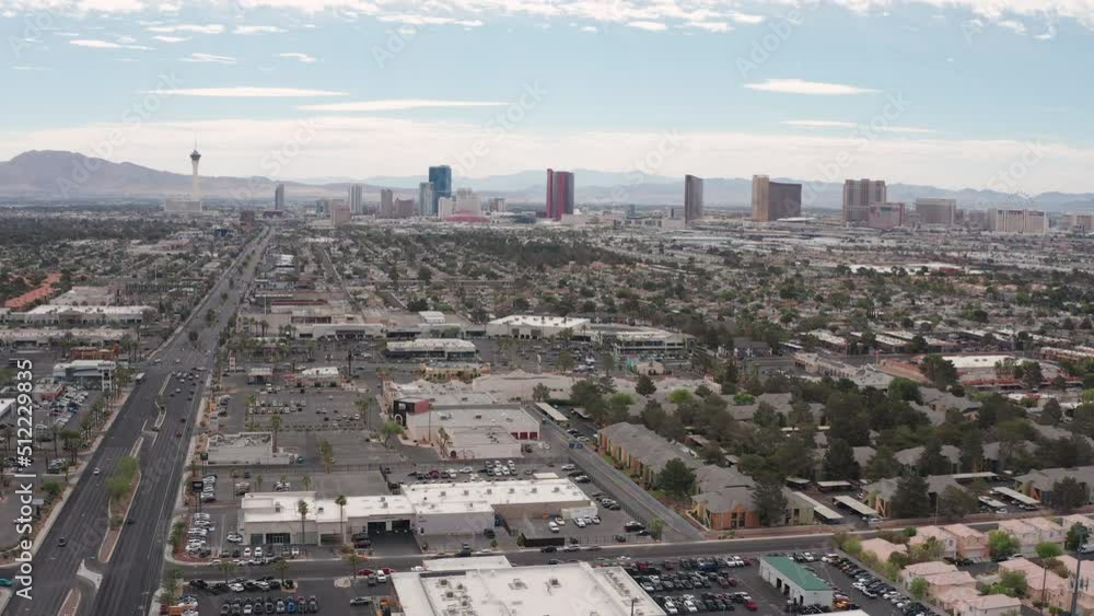 Aerial drone view Las Vegas commercial stores and shops with city skyline Aerial drone view Las Vegas commercial stores and shops with city skyline