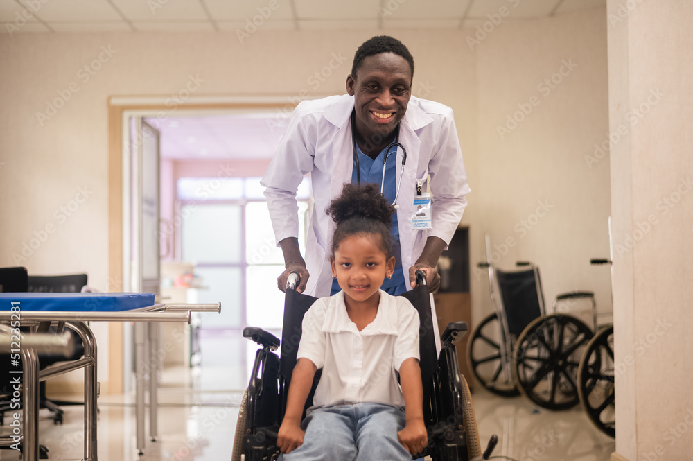 African American pediatric doctor with kids patient in hospital, African American male pediatrician
