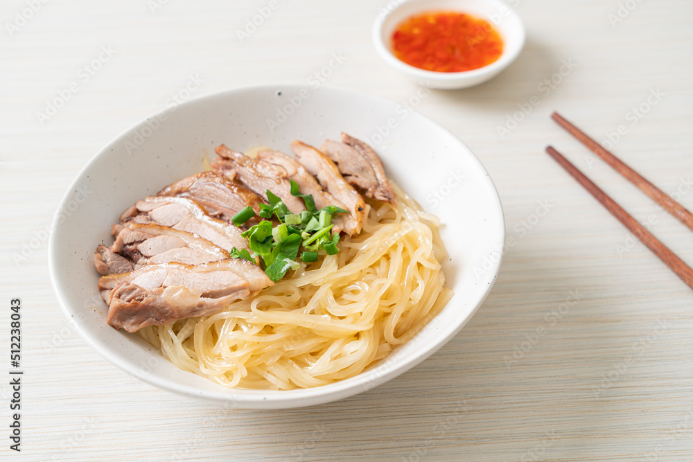 dried noodles with stewed duck in white bowl dried noodles with stewed duck in white bowl