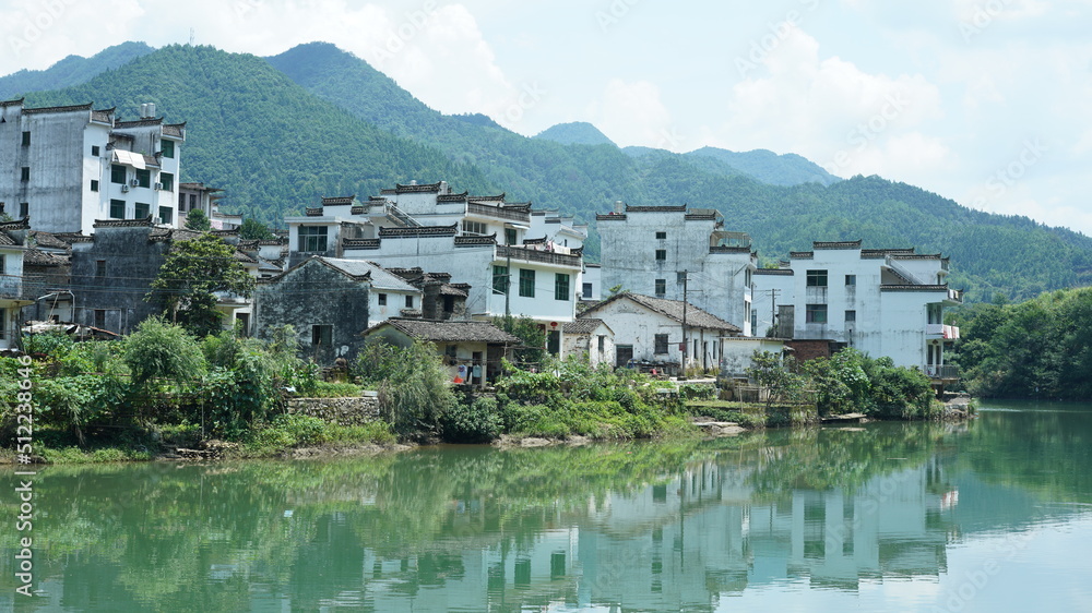 The beautiful Chinese countryside village view with  the old traditional buildings surrounded by the natural environment
