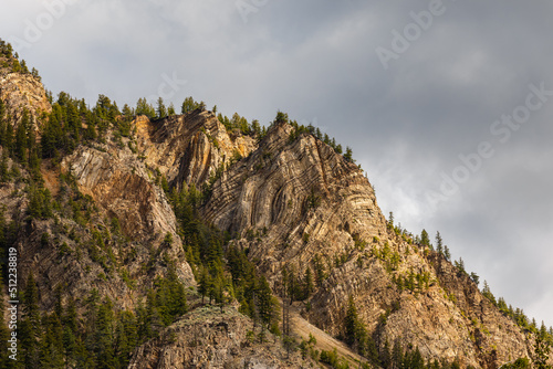 Dramatic Storm Clouds over the Rocky Mountain in Hedley BC. Upper Similkameen on a cloudy overcast day. photo