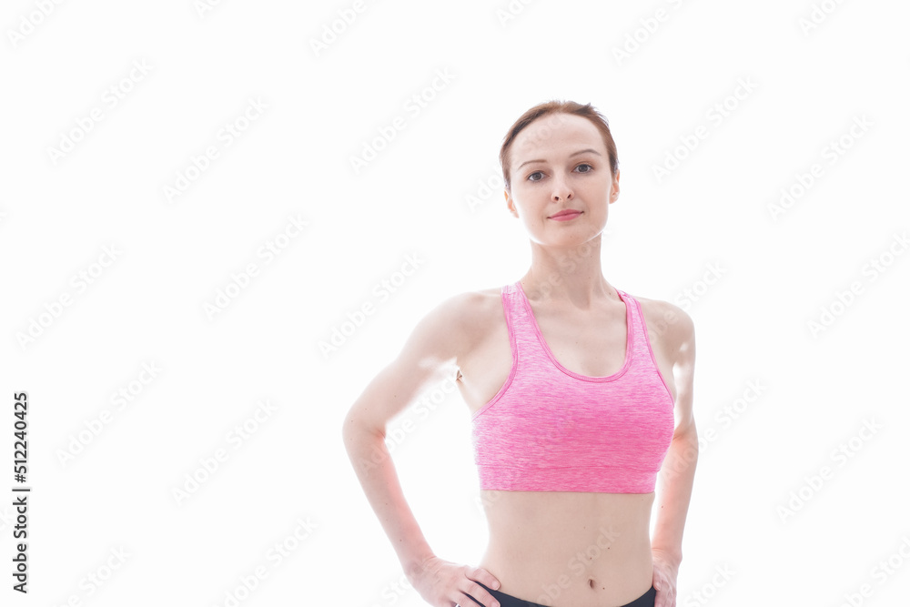 ダイエットをするスポーツウェアを着た若い女性 ダイエットをするスポーツウェアを着た若い女性