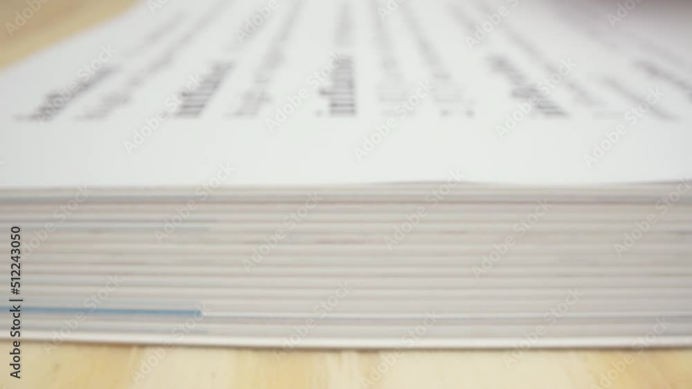 Slow motion motorized moving shot of highlighting the word inflation in a fake dictionary, shot with macro probe lens Slow motion motorized moving shot of highlighting the word inflation in a fake dictionary, shot with macro probe lens