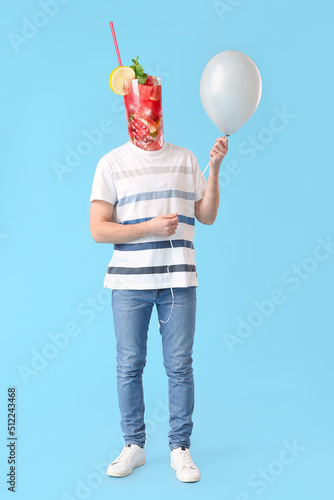 Man with balloon and waterm...