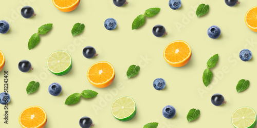 Citrus fruits  berries and mint on light color background. Pattern for design