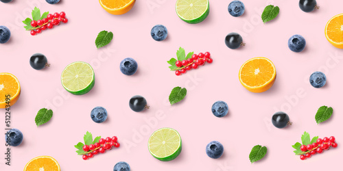 Citrus fruits  berries and mint on pink background. Pattern for design