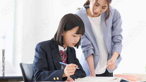 Fototapeta 塾で授業を受ける女子学生