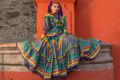 Portrait of a Mexican woman wearing a traditional dress for folk dance © Elmer Hidalgo Photo