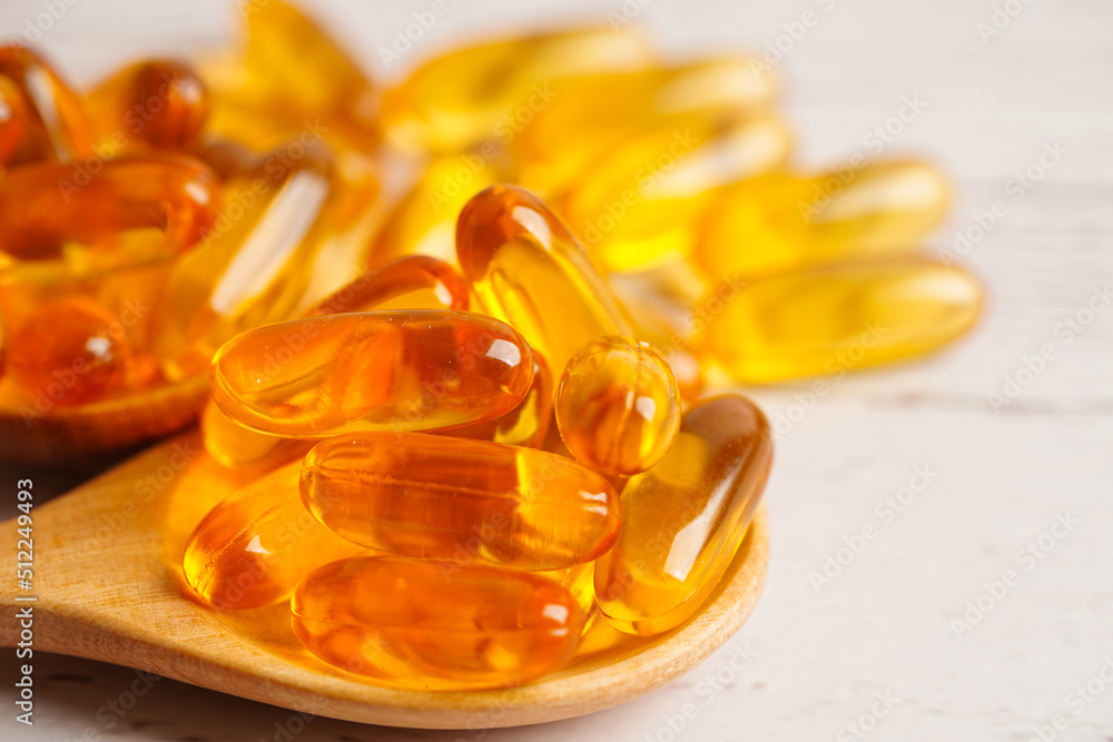 Fish oil or Cod liver oil gel in capsules with omega 3 vitamins, supplementary healthy food Fish oil or Cod liver oil gel in capsules with omega 3 vitamins, supplementary healthy food