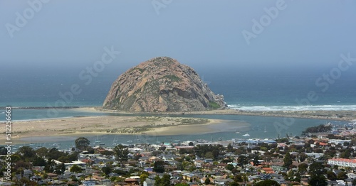 spectacular morro rock,  the pacific ocean,  and the town of morro bay,  from the black hill hiking trail in san luis obispo  county on the central california coast on a sunny day photo