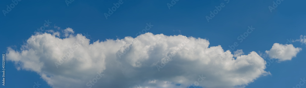 Big white cloud in the blue sky.