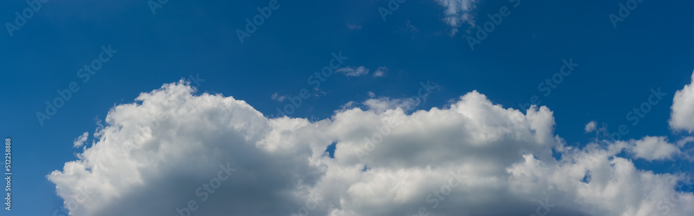 Blue sky background with clouds.