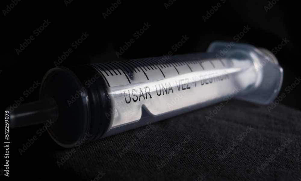 Perspective of a disposable syringe Perspective of a disposable syringe