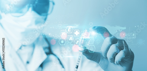 health insurance concept. Doctor or scientist with stethoscope in hand with syringe vaccine showing health insurance related icons on virtual screen.