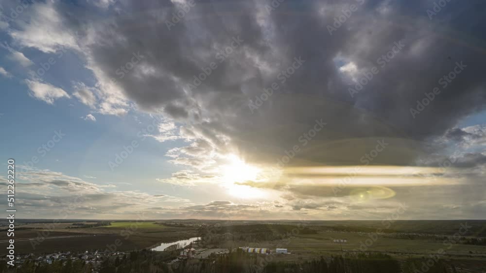 Beautiful cloudy landscape in summer time lapse. Blue sky with clouds 4K. Wonderful summer weather. The sun shines through the clouds. Clouds are floating in the sky. Loop. Beautiful cloudy landscape in summer time lapse. Blue sky with clouds 4K. Wonderful summer weather. The sun shines through the clouds. Clouds are floating in the sky. Loop.