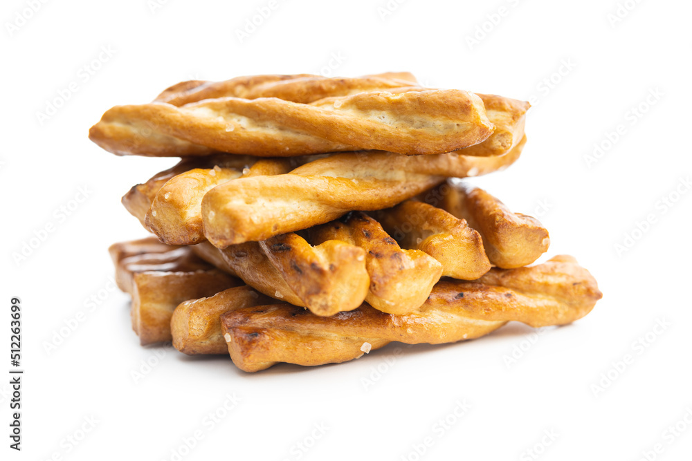 Salted pretzel sticks. Salted crackers isolated on white background.