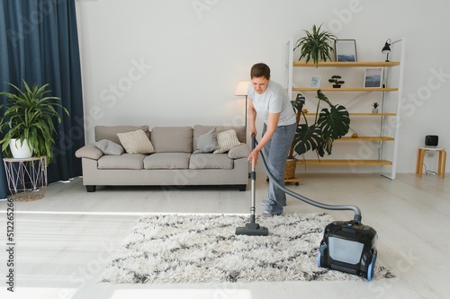 Middle-aged woman cleaning new apartment.