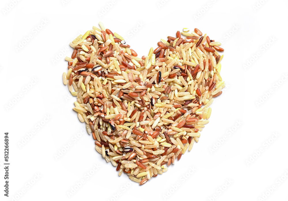 heart rice , brown rice on white background , various color mixed thai rice for cooking food , Loonzain rice brown black red white purple health food background.