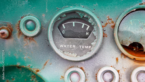  Broken water temperature indicator. Water temperature breaking and rusting. Water pressure temperature display. Old pump.