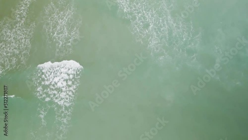 Wallpaper Mural Overhead aerial view of waves rolling towards beach Torontodigital.ca