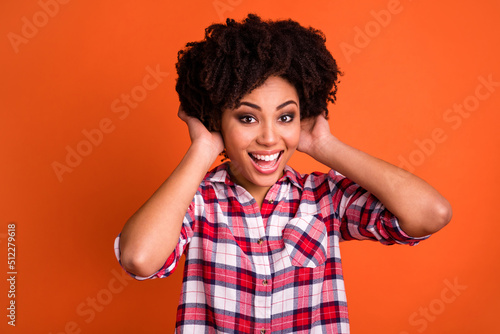 Foto Portrait of cheerful excited person hands touch wavy hairdo toothy smile isolate