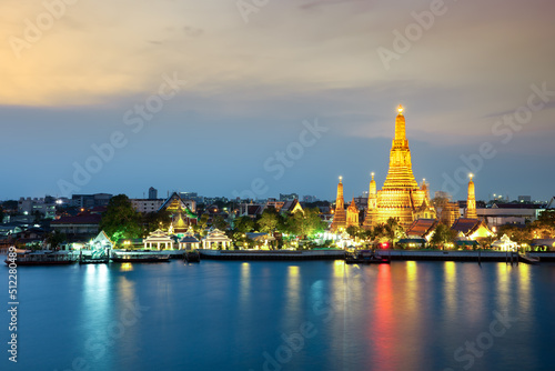 The beautiful temple along the Chao Phraya river at twilight