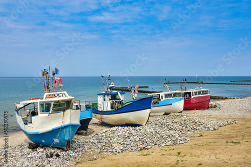 colorful fishing boats, a beach and the Baltic Sea in Poland © VinyLove Foto