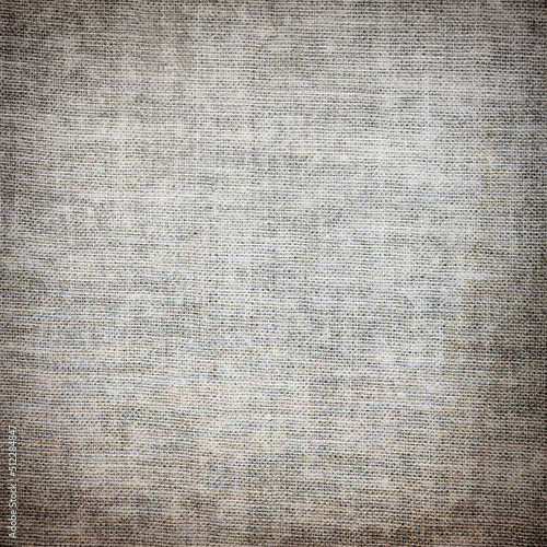 grunge background old canvas fabric texture parchment paper background and vignette