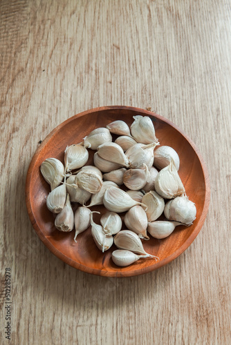 garlic in a wooden bowl