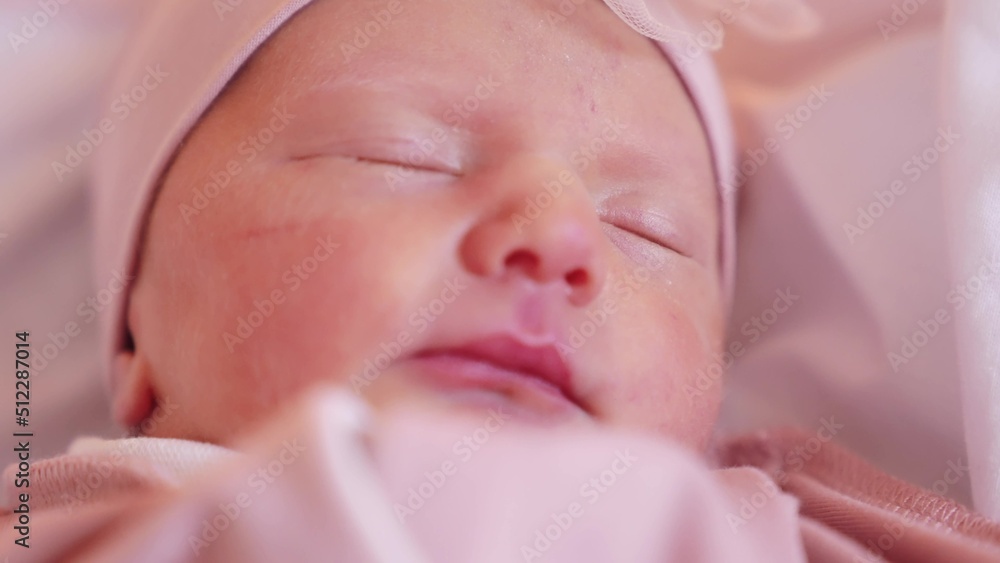 newborn happy baby a girl sleeping. happy family baby dream concept. newborn girl in a hat and suit sleeping in the maternity hospital waiting for discharge. cute beautiful baby sleeping lifestyle newborn happy baby a girl sleeping. happy family baby dream concept. newborn girl in a hat and suit sleeping in the maternity hospital waiting for discharge. cute beautiful baby sleeping lifestyle