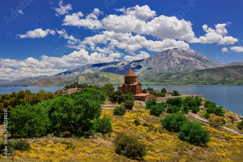 фотографія The Cathedral of the Holy Cross on Akdamar Island, in Lake Van in eastern Turkey, is a medieval Armenian Apostolic cathedral, built as a palatine church for the kings of Vaspurakan