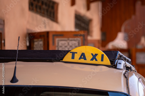 A taxi cab in the city
