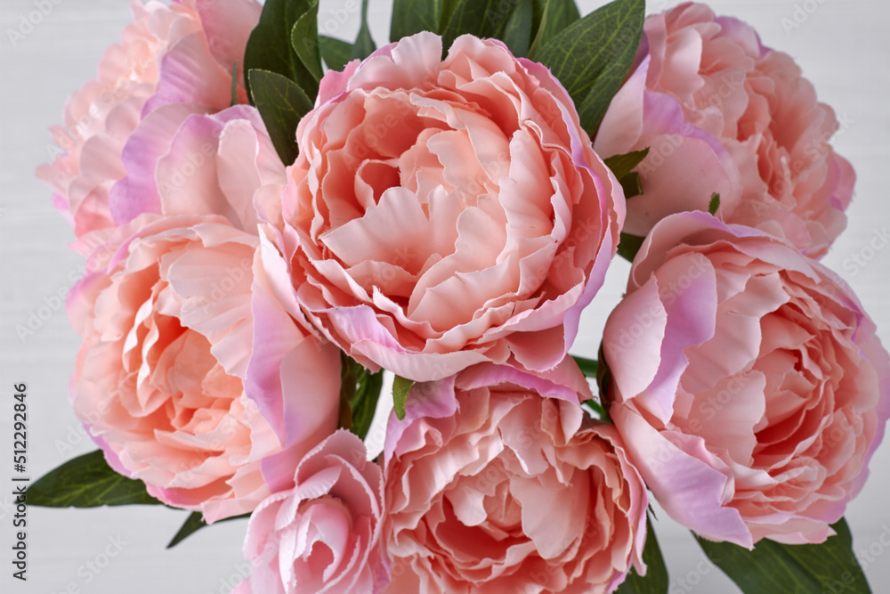 Fototapeta premium Bouquet of pink peony flowers close up. Womens day or wedding concept.