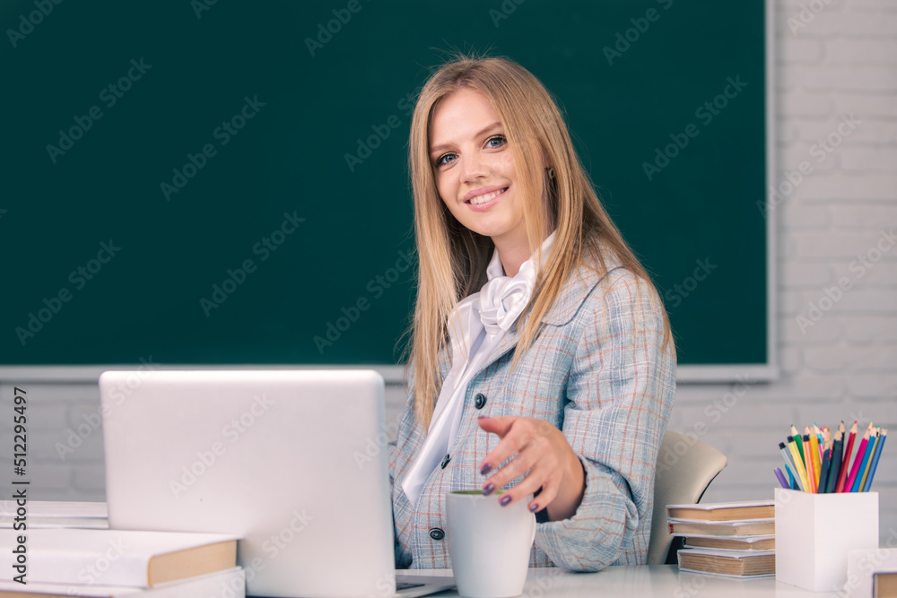 Female student on lesson lecture in classroom at high school or college. Education in high school concept. Female student on lesson lecture in classroom at high school or college. Education in high school concept.