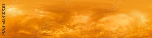 A red burning overcast sunset sky panorama. Hdr seamless spherical equirectangular 360 panorama. Sky dome or zenith for 3D visualization and sky replacement for aerial drone 360 panoramas. © panophotograph