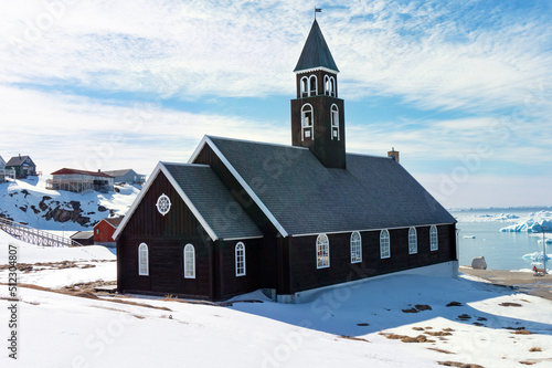 Print op canvas Zion church in Ilulissat Greenland with sunny snowy landscape